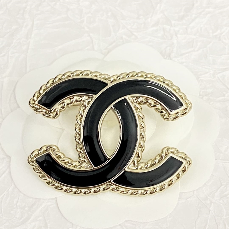 Ch*el brooches